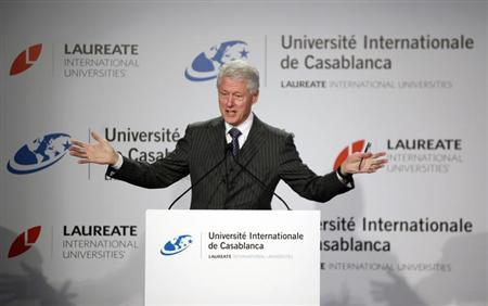 Former U.S. President Bill Clinton speaks during a news conference at the international university in Casablanca