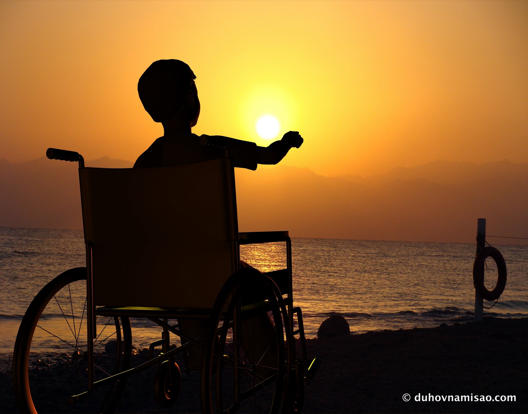 kid-in-wheelchair-at-the-beach-in-sunset1